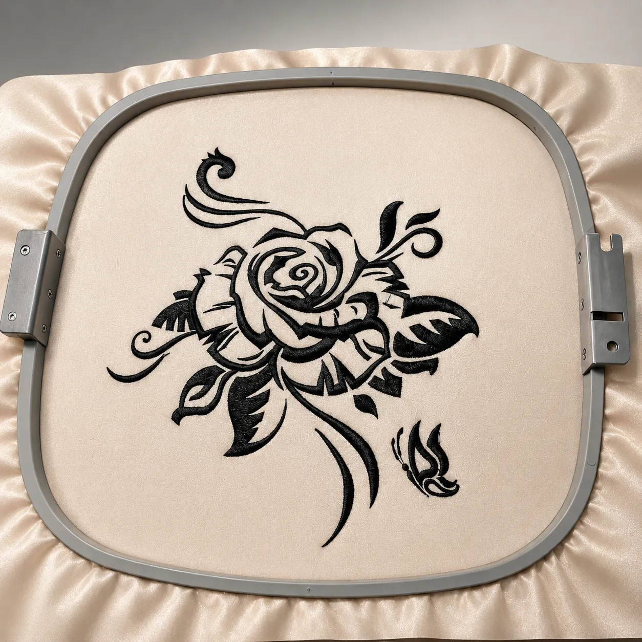 Black floral embroidery in hoop